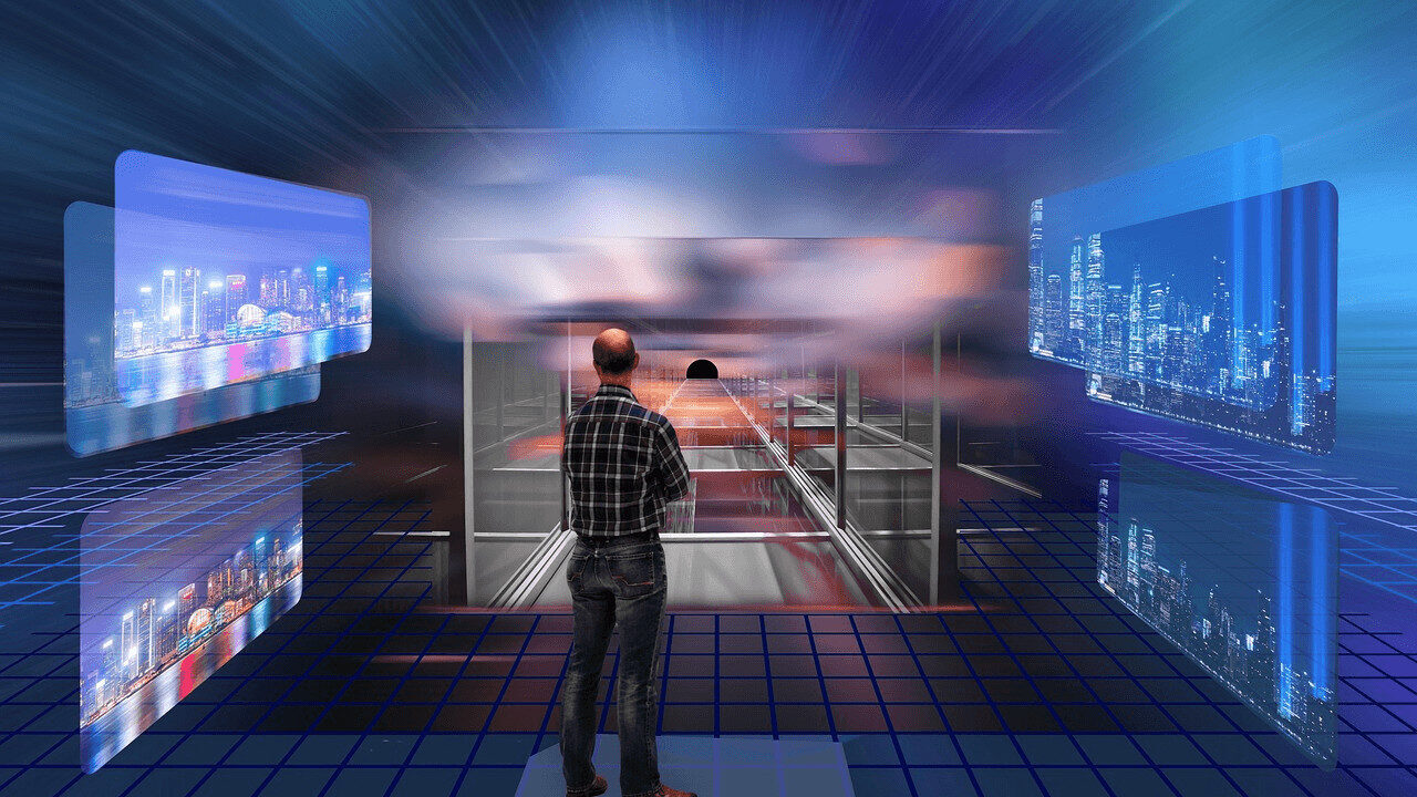 Amazon'S Jeff Gattis Predicts A Shift To Cloud Gaming As Tech Prices Continue To Climb Man Standing In A Modern Room With Many Windows